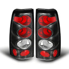 Raxiom 99-02 Chevrolet Silverado 1500 Fleetside Axial Series Tail Lights- Black- Smoked Lens