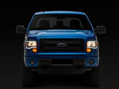 Raxiom 09-14 Ford F-150 Axial Series Headlight w/ SEQL LED Bar- Blk Housing (Clear Lens)