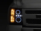 Raxiom 07-13 Chevrolet Silverado 1500 LED Halo Projector Headlights- Black Housing- Clear Lens
