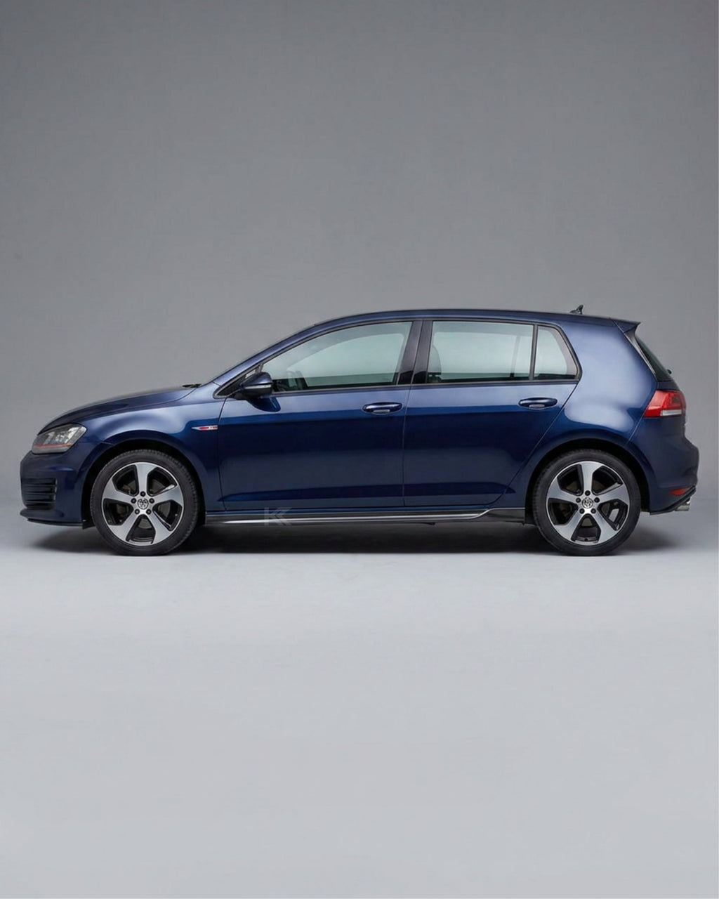 VW Golf MK7 GTI Carbon Fiber Side Skirt Extensions – Gloss Black (2014–2016)