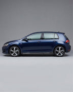 VW Golf MK7 GTI Carbon Fiber Side Skirt Extensions – Gloss Black (2014–2016)