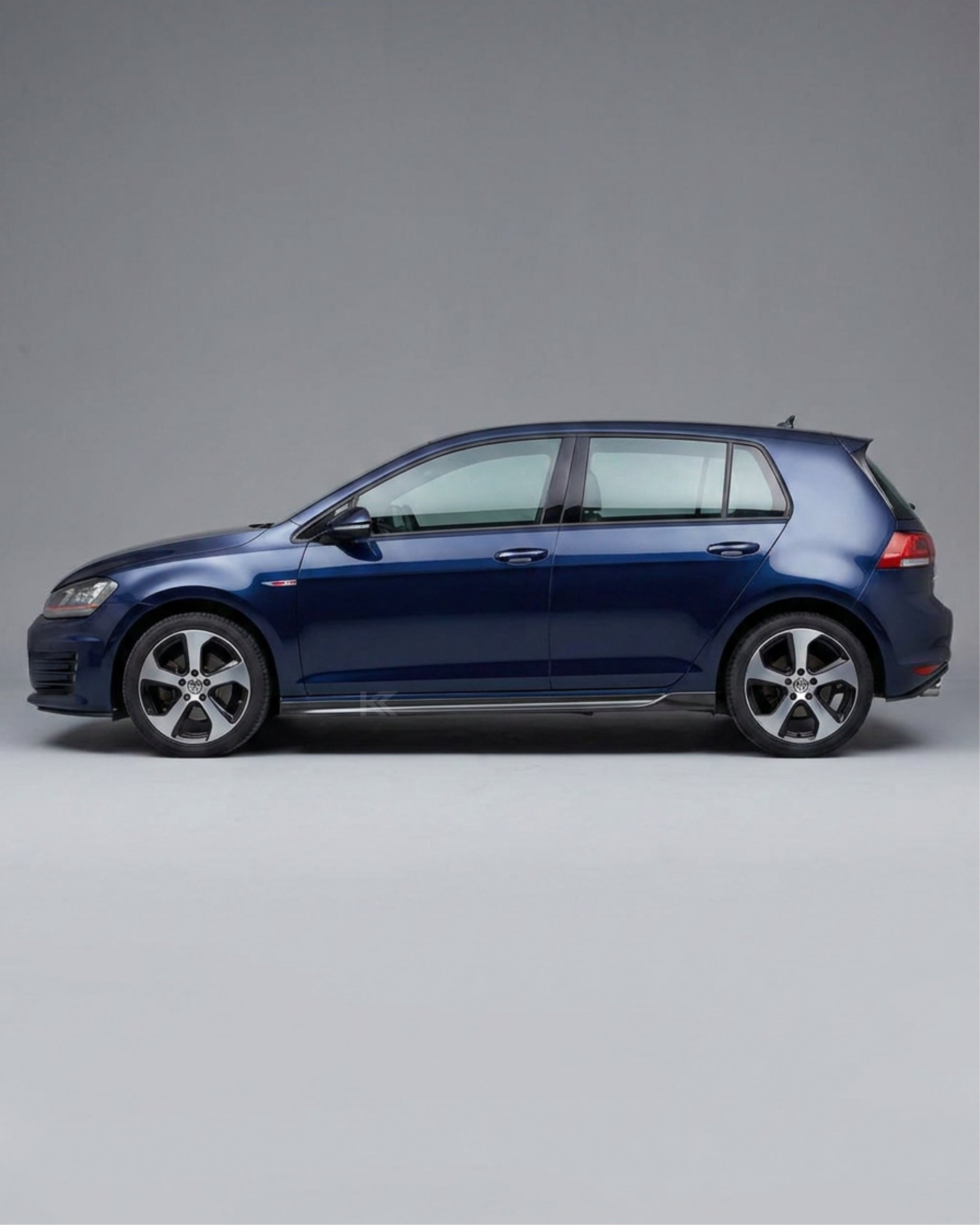 VW Golf MK7 GTI Carbon Fiber Side Skirt Extensions – Gloss Black (2014–2016)