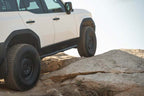 DV8 Offroad 24-25 Toyota Land Cruiser OE Plus Side Steps - Black Steel