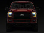 Raxiom 15-17 Ford F-150 LED Projector Headlights with LED Amber DRL- Black Housing- Clear Lens