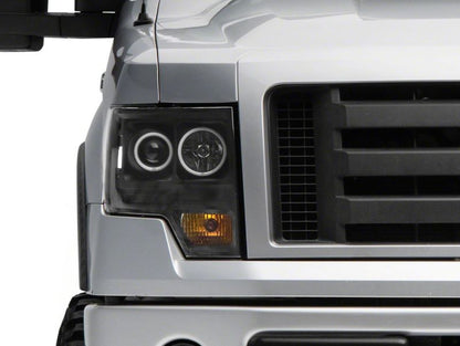 Raxiom 09-14 Ford F-150 Super White LED Halo Projector Headlights- Blk Housing (Clear Lens)