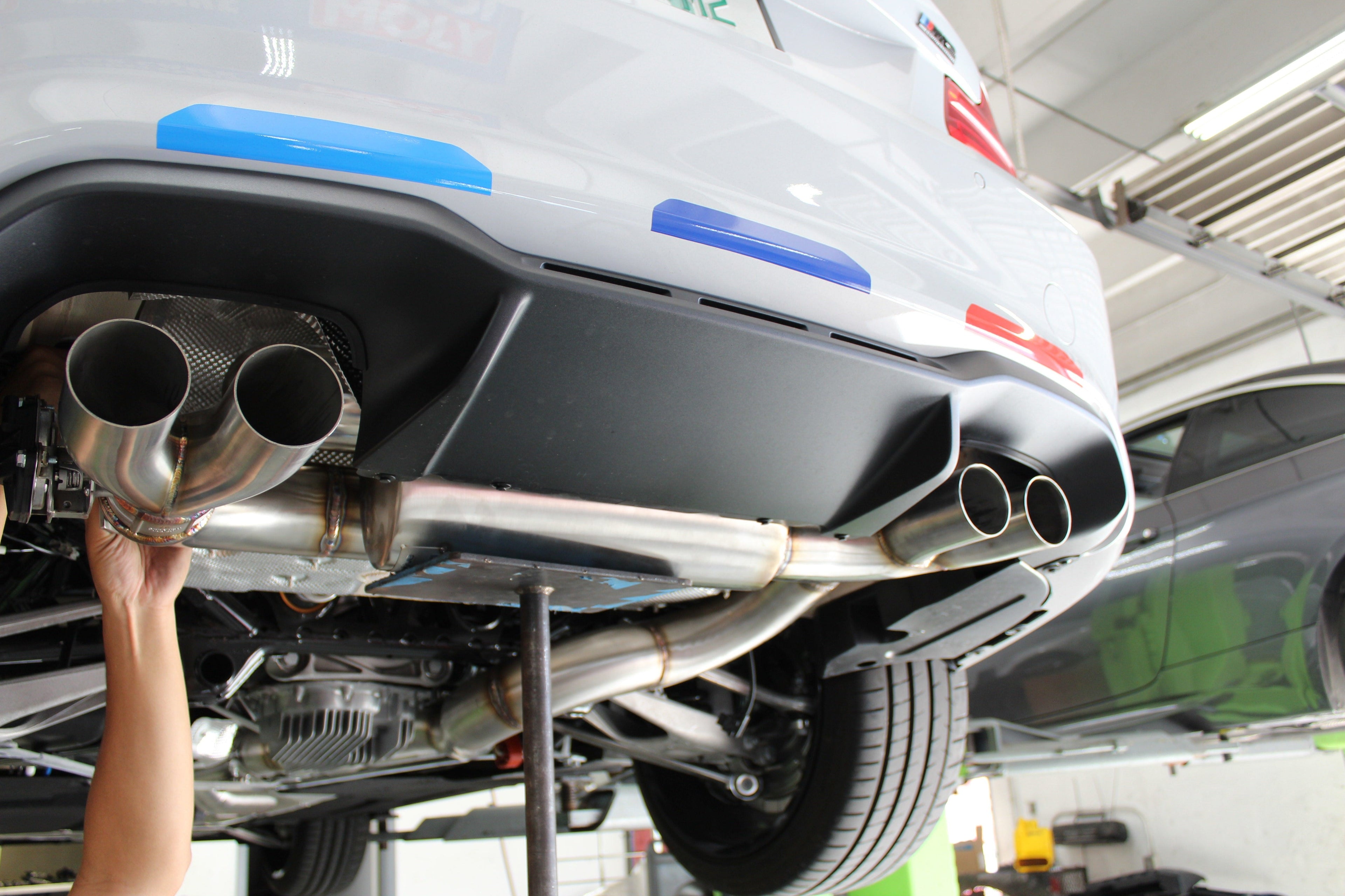 F87 M2 Competition Signature Exhaust System includes Active F-brace