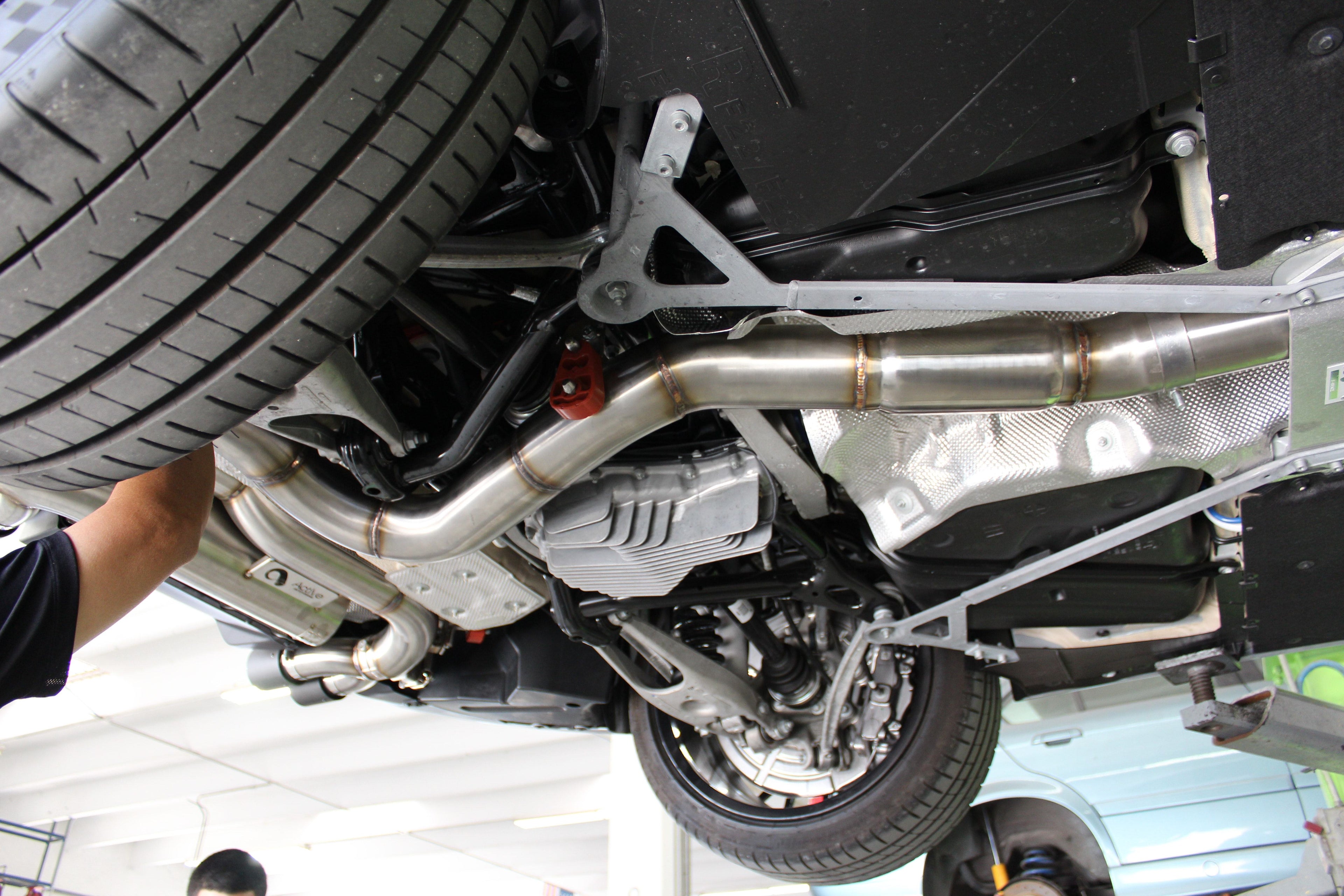 F87 M2 Competition Signature Exhaust System includes Active F-brace