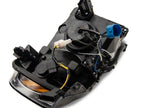 Raxiom 02-05 Dodge RAM 1500/2500/3500 Axial LED Projector Headlights- Black Housing (Clear Lens)