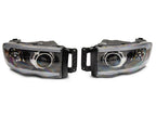 Raxiom 02-05 Dodge RAM 1500/2500/3500 Axial LED Projector Headlights- Black Housing (Clear Lens)