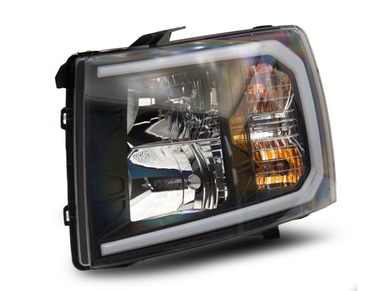 Raxiom 07-13 Chevrolet Silverado 1500 Axial Headlights w/ SEQL LED Bar- Black Housing (Clear Lens)