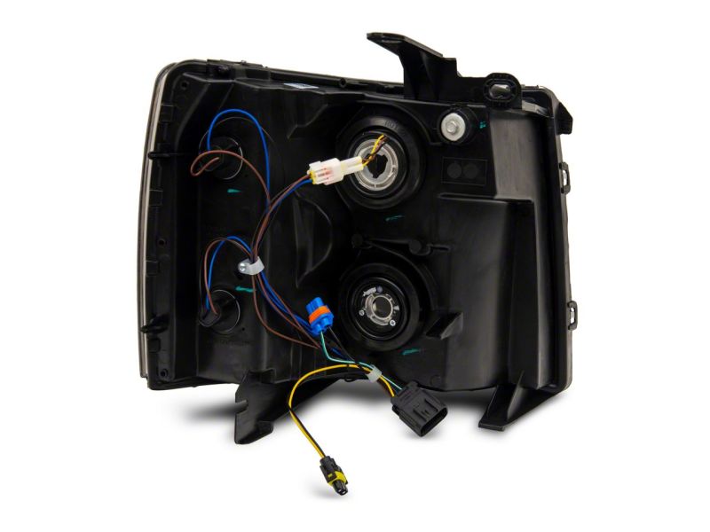 Raxiom 07-13 Chevrolet Silverado 1500 Axial Headlights w/ SEQL LED Bar- Black Housing (Clear Lens)