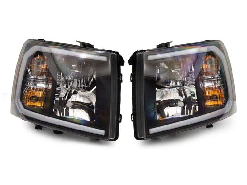 Raxiom 07-13 Chevrolet Silverado 1500 Axial Headlights w/ SEQL LED Bar- Black Housing (Clear Lens)