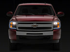 Raxiom 07-13 Chevrolet Silverado 1500 Axial Headlights w/ SEQL LED Bar- Black Housing (Clear Lens)