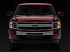Raxiom 07-13 Chevrolet Silverado 1500 Axial Headlights w/ SEQL LED Bar- Black Housing (Clear Lens)