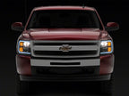 Raxiom 07-13 Chevrolet Silverado 1500 Axial Series Headlights w/ LED Bar- Black Housing (Clear Lens)