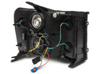 Raxiom 07-13 GMC Sierra 1500 Axial Series Headlights w/ LED Bar- Black Housing (Clear Lens)