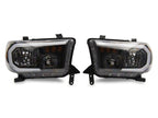 Raxiom 07-13 Toyota Tundra Axial Series Headlights w/ SEQL LED Bar- Black Housing (Clear Lens)