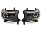Raxiom 07-13 Toyota Tundra Axial Series Projector Headlights w/ LED Bar- Black Housing (Clear Lens)