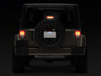 Raxiom 07-18 Jeep Wrangler JK Axial Series License Plate Bracket w/ LED Brake Light