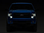 Raxiom 09-14 Ford F-150 Axial G4 Light Bar Switchback Projector Headlights- Blk Housing (Clear Lens)