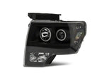 Raxiom 09-14 Ford F-150 Super White LED Halo Projector Headlights- Black Housing (Clear Lens)