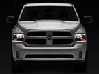 Raxiom 09-18 Dodge RAM 1500/2500/3500 Axial Headlights w/ SEQL LED Bar- Black Housing (Clear Lens)