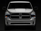 Raxiom 09-18 Dodge RAM 1500/2500/3500 Axial Series Headlights w/ LED Bar- Black Housing (Clear Lens)