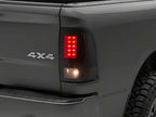 Raxiom 09-18 Dodge RAM 1500/2500/3500 Axial Series LED Tail Lights- Black Housing- Smoked Lens