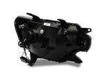 Raxiom 12-15 Toyota Tacoma Axial Series Projector Headlights w/ LED Bar- Black Housing (Clear Lens)