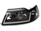 Raxiom 99-04 Ford Mustang Axial Series Headlights w/ LED Bar- Black Housing (Clear Lens)