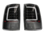 Raxiom 09-18 Dodge RAM 1500 Axial Series LED Tail Lights- Black Housing- Clear Lens