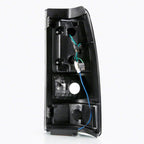 Raxiom 03-06 Chevrolet Silverado 1500 Axial Series LED Tail Lights- Black Housing- Smoked Lens