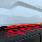 Putco 2024+ Ford F150 w/Factory LED Tail Light & OBS 60in Red Blade Tailgate Light Bar Plug-N-Play