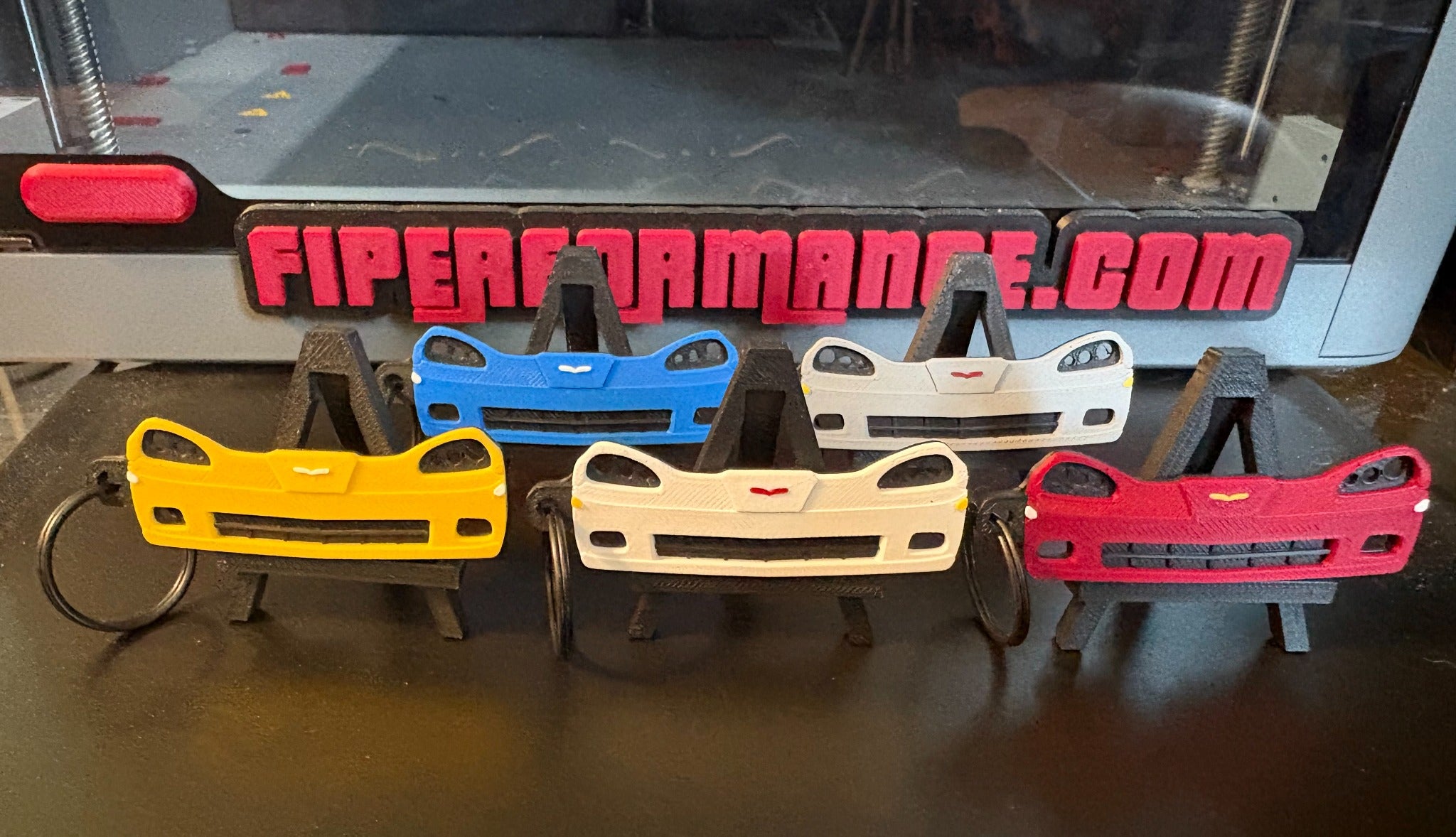 Corvette C6 3D-printed keychains in multiple colors