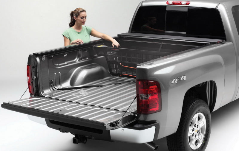 Roll-N-Lock 07-13 Chevy Silverado/Sierra w/ OE Rail Caps LB 96-1/4in Cargo Manager