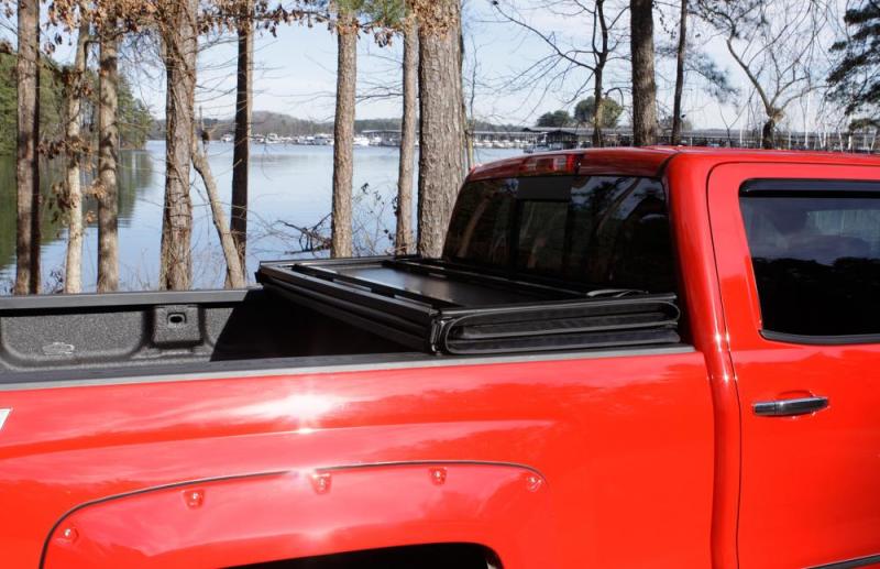 Lund 07-13 Chevy Silverado 1500 Fleetside (5.8ft. Bed) Hard Fold Tonneau Cover - Black