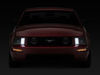 Raxiom 05-09 Ford Mustang w/ Halogen Projector Headlights- Black Housing (Clear Lens) (No GT500 )