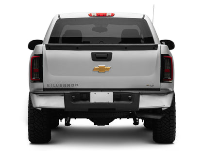 Raxiom 07-13 Chevy Silverado 1500 G2 LED Tail Lights- Black Housing (Clear Lens)